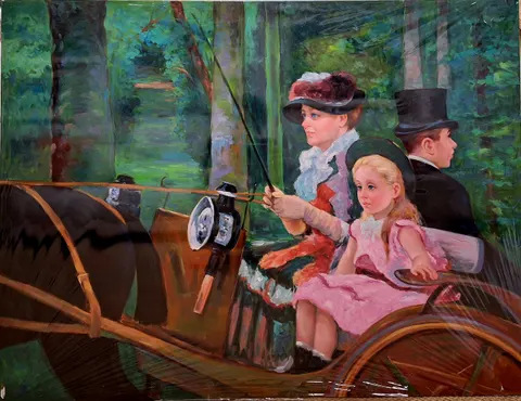 A Woman and a Girl Driving